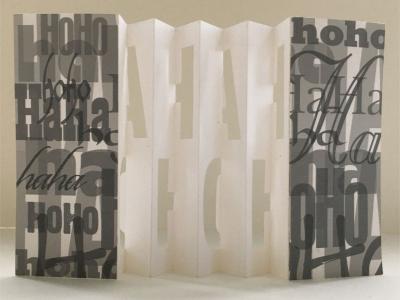 HAHAHOHO – symmetrical letters cut and opened on the fold, seen from the back