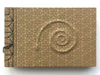 Ammonite flick book with Japanese stab binding, cover paper pasted over string spiral